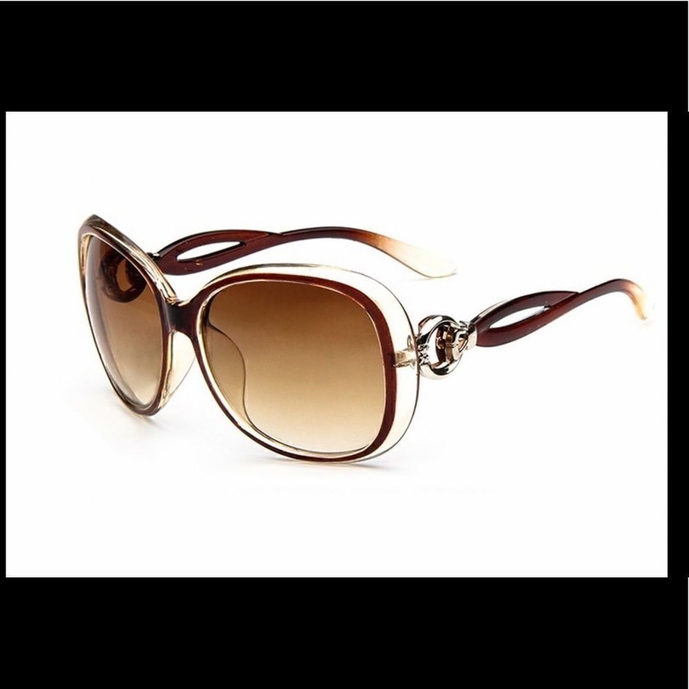 NWT hollow frame anti-UV oversized sunglasses . Have Brown and Black .